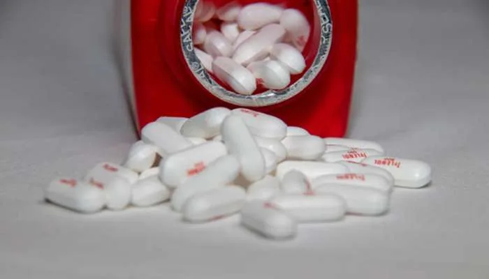 A medicine bottle highlighting packaging safety standards introduced after the 1982 Chicago Tylenol murders. A medicine bottle highlighting packaging safety standards introduced after the 1982 Chicago Tylenol murders.