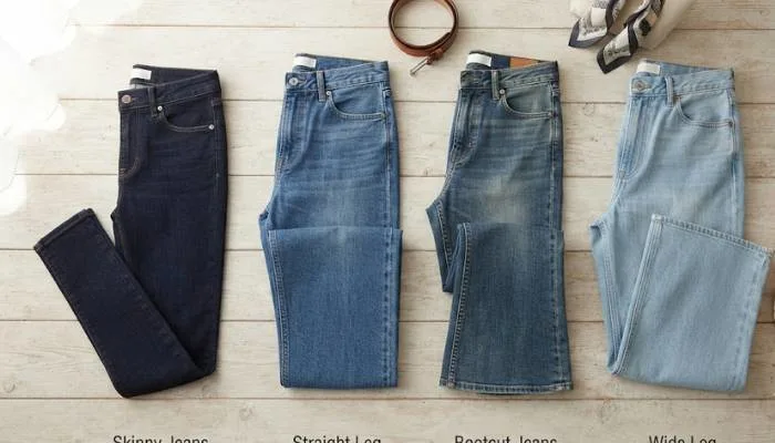 Flat lay arrangement showcasing different denim styles including straight leg, wide leg, bootcut, and skinny jeans. Flat lay arrangement showcasing different denim styles including straight leg, wide leg, bootcut, and skinny jeans.