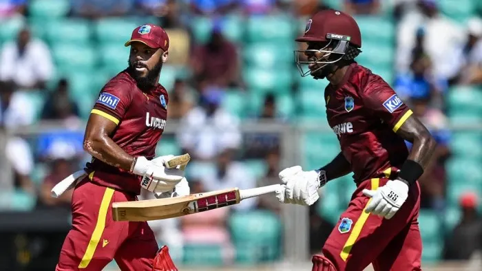 Justin Greaves and John Campbell share a strong 135-run opening partnership for the West Indies against India.